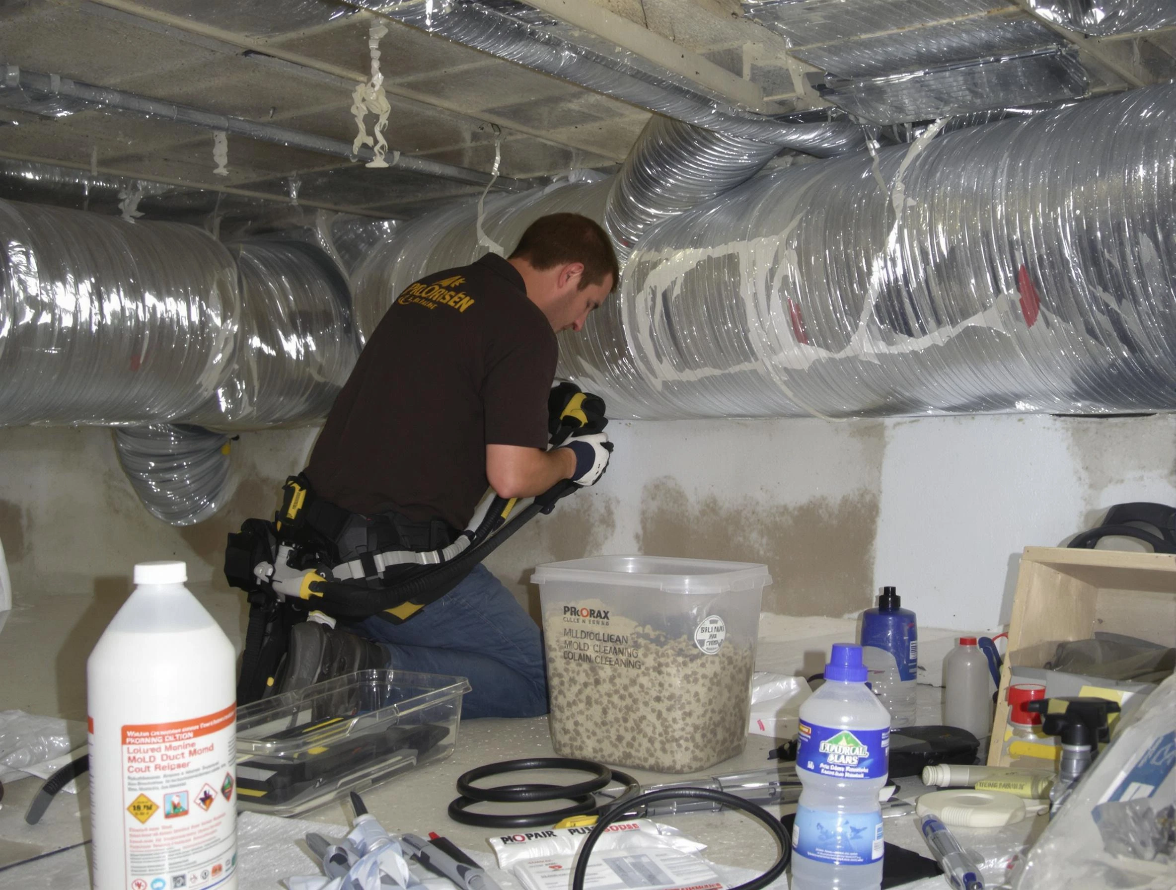 Evans Air Duct Cleaning specialist performing professional mold removal from air ducts in Evans